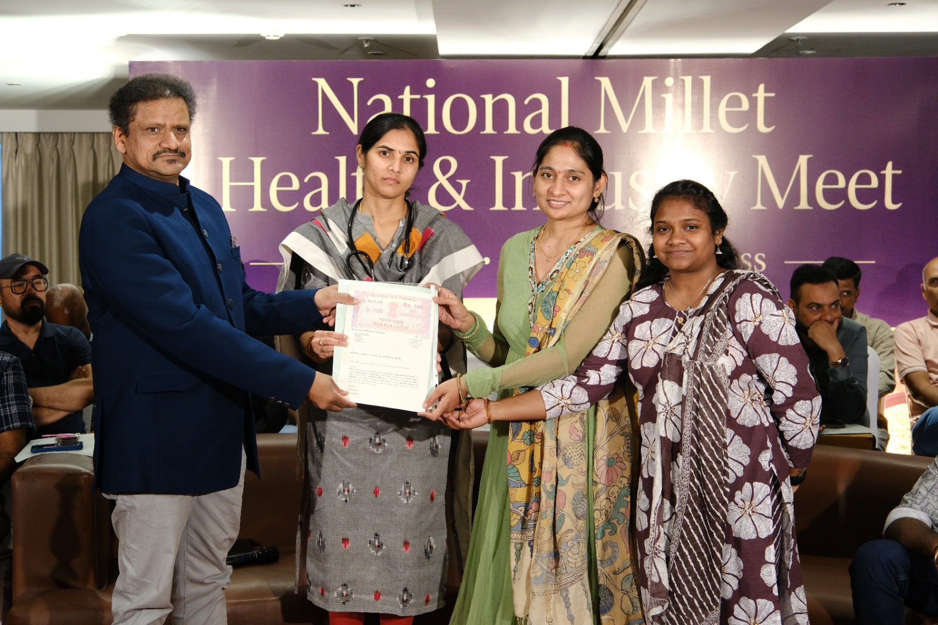 Award handover at National Millet Health & Industry Meet