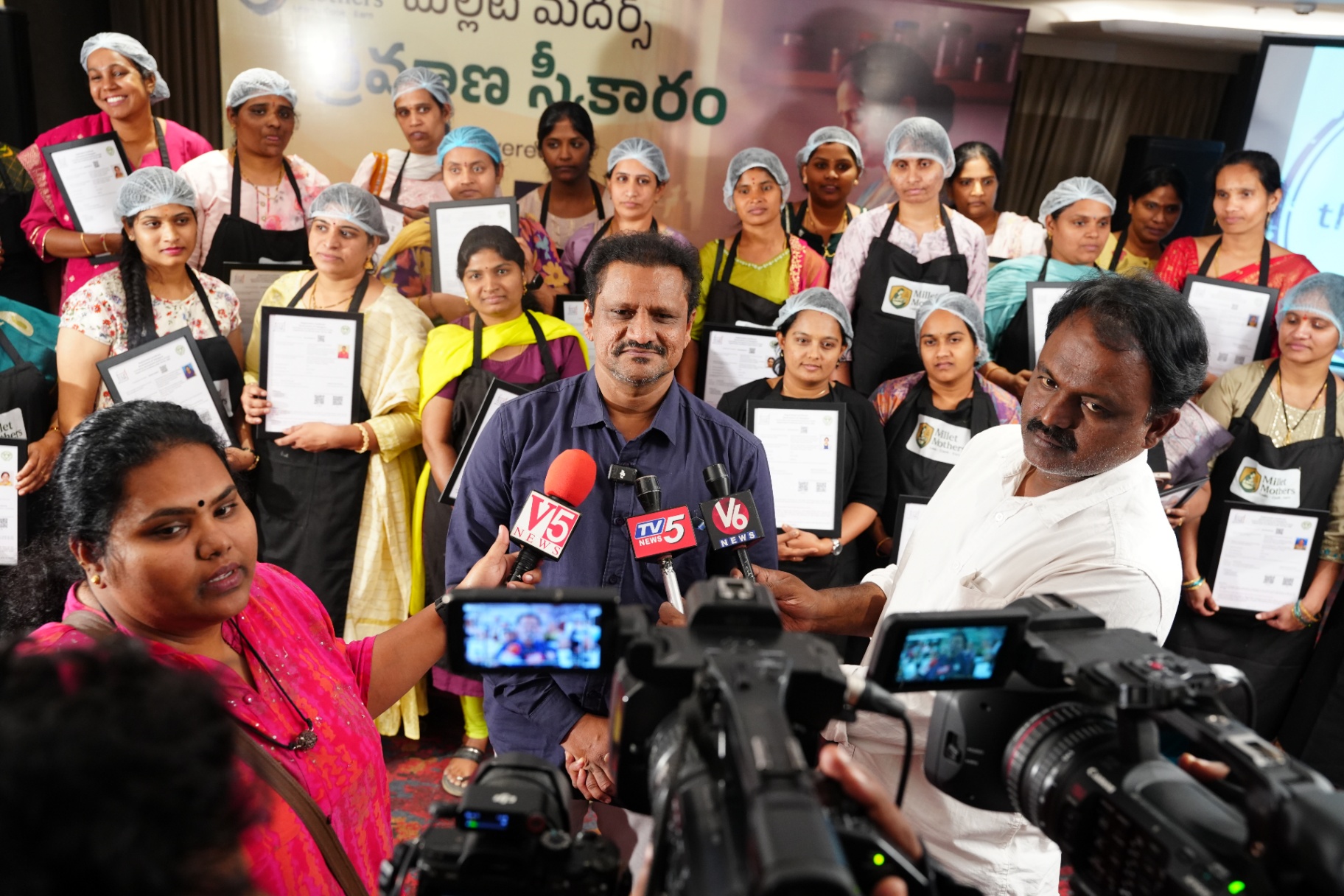 Press interaction at Millet Mothers graduation